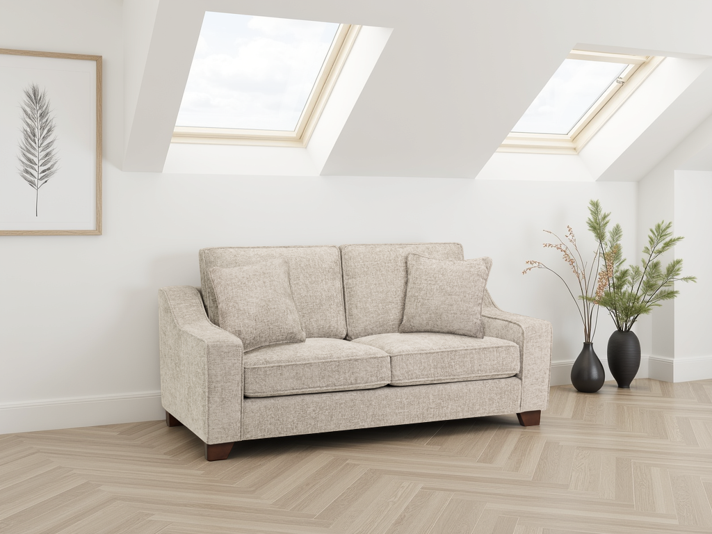 Beige sofa in a room with skylights and decorative plants.