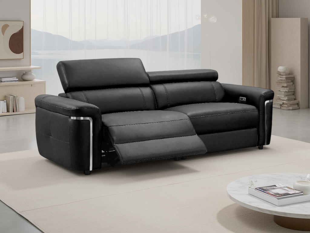 Black leather sofa in a modern living room setting
