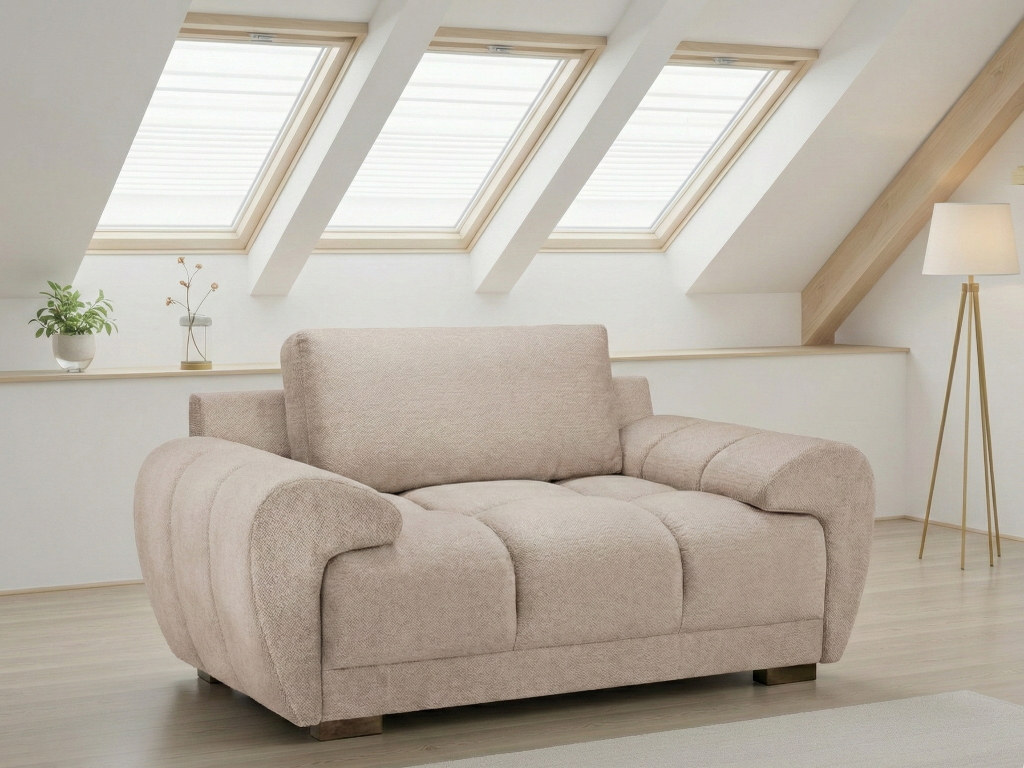 Beige sofa in a room with skylights and a lamp.