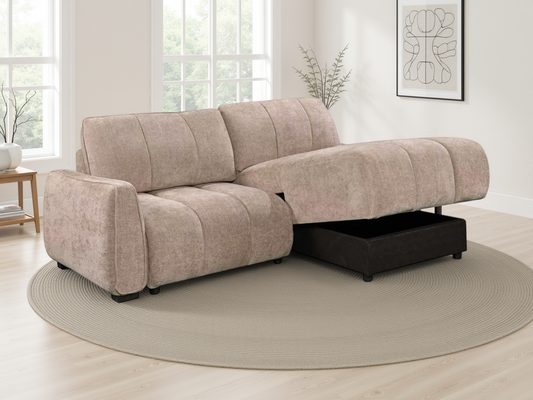 A beige upholstered sectional sofa with a chaise lounge and a dark storage ottoman underneath.