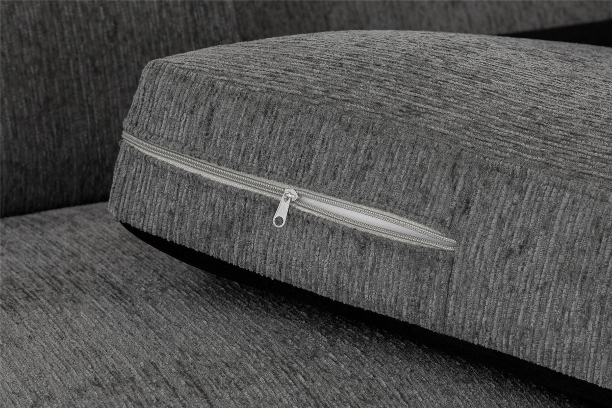 Gray fabric surface with a zipper detail