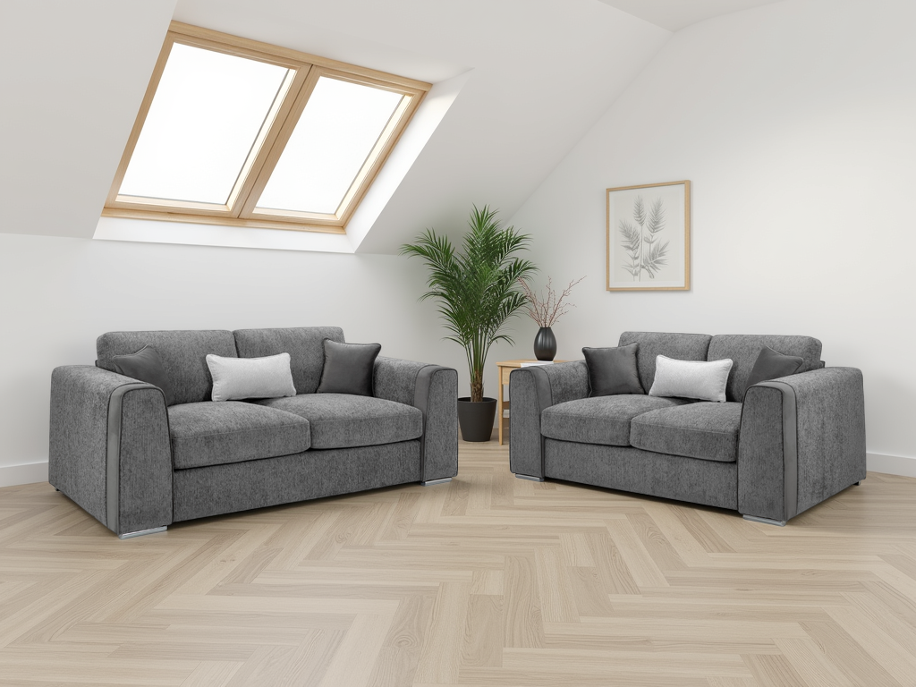 Gray sofa set in a room with a skylight and plant