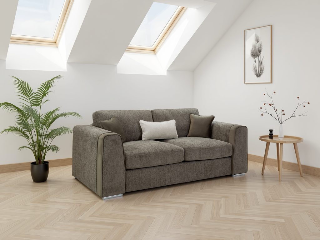 Gray sofa in a room with skylights, a plant, and a small table.