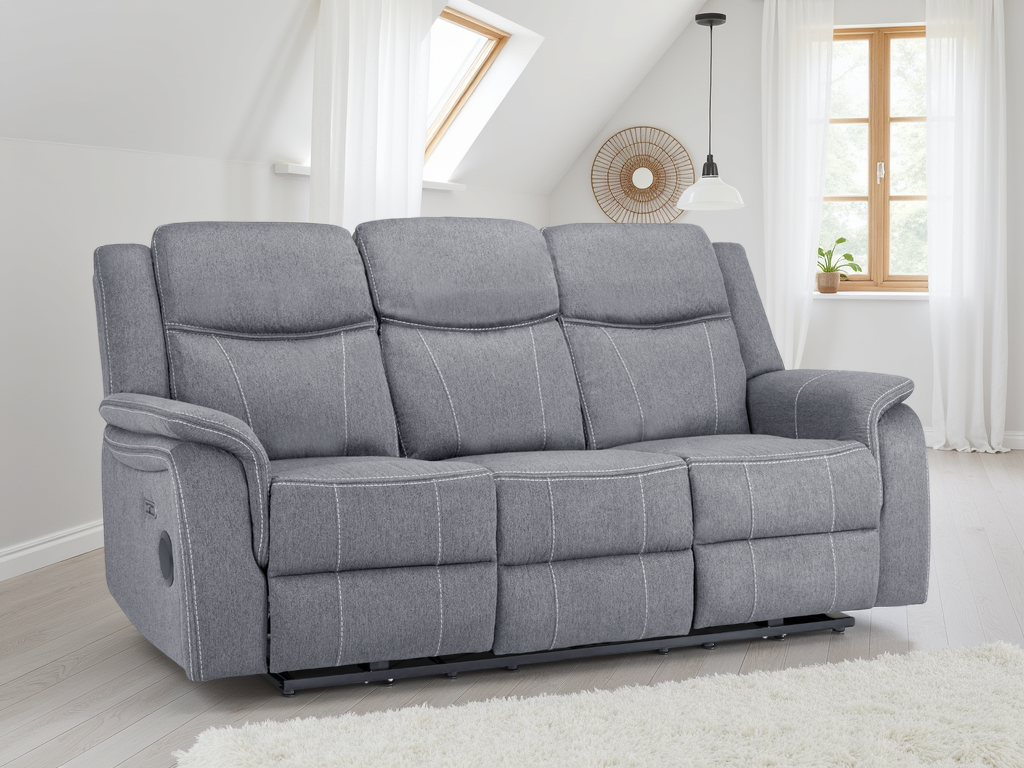 Gray sofa in a living room with white walls and windows.