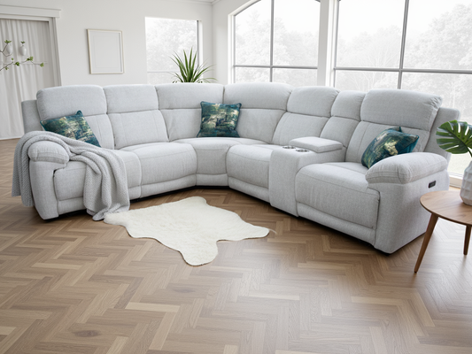 beige sectional sofa with cushions in a living room setting
