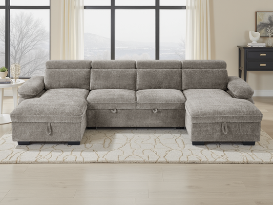 Gray sectional sofa in a living room setting with large windows.