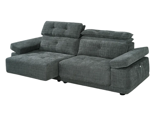 A dark gray textured fabric reclining sofa with a chaise lounge on the left shown against a plain white background.