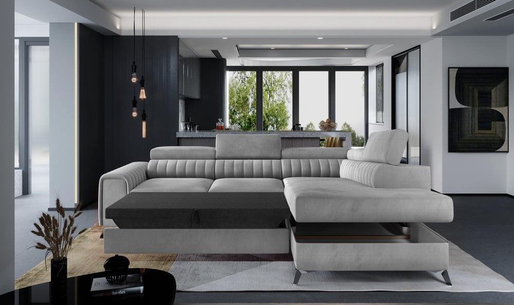 A modern sectional sofa in light grey and dark grey, shown in a contemporary living room.