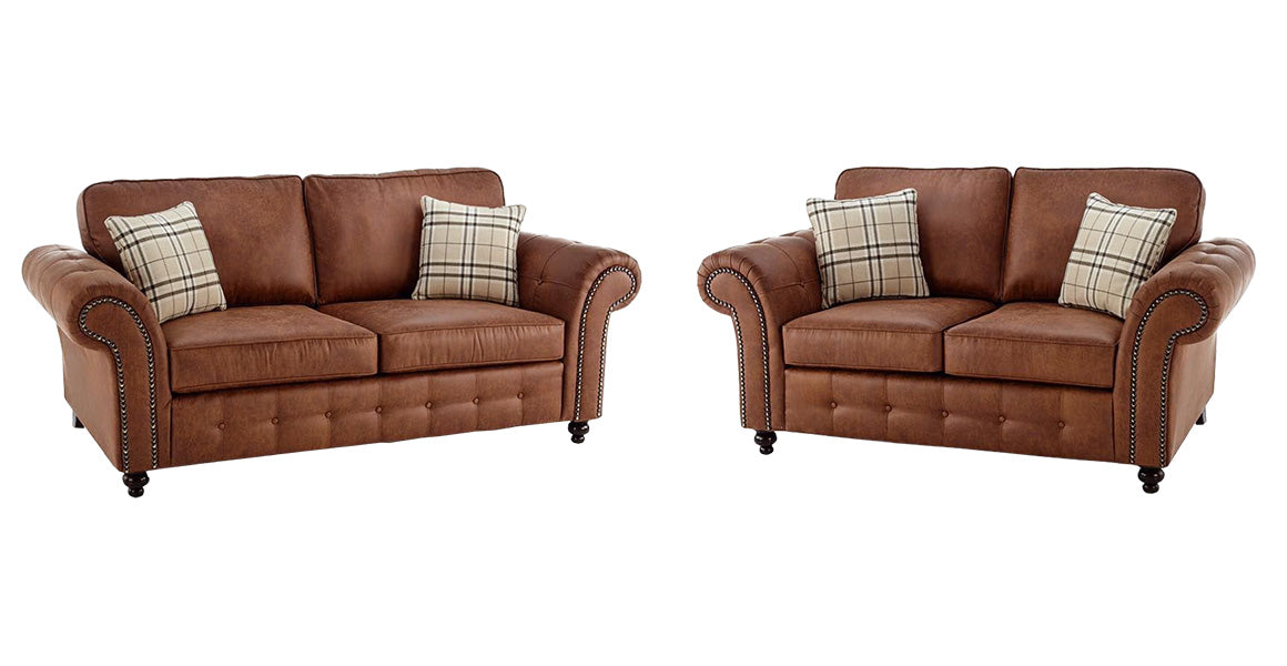 A matching two-piece brown leather loveseat shown against a plain white background.