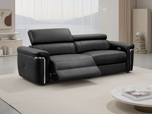 Black leather sofa in a modern living room setting