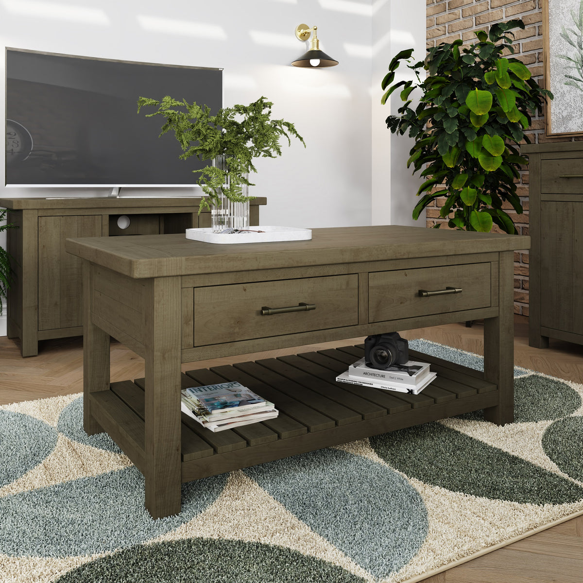 Wooden coffee table in a living room setting with a TV and plants.