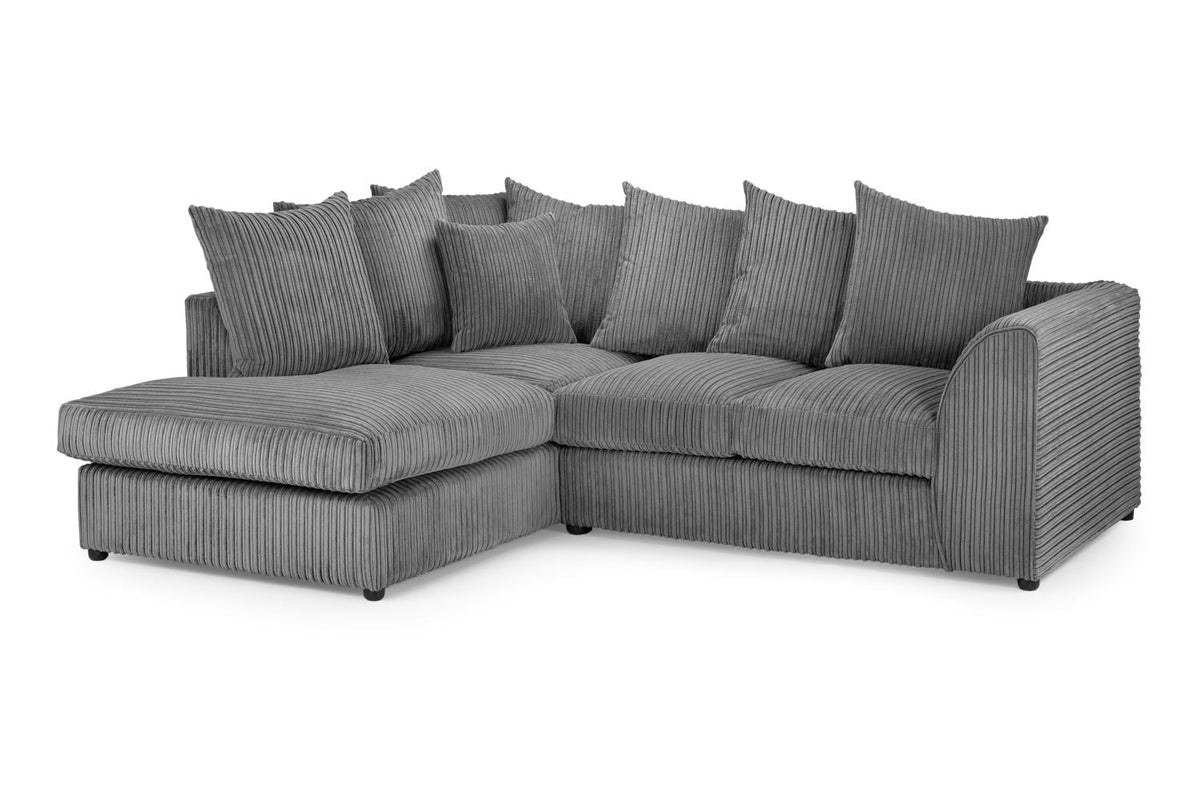 Gray sectional sofa with multiple cushions on a white background