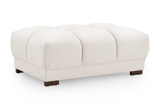 White ottoman with brown legs on a white background