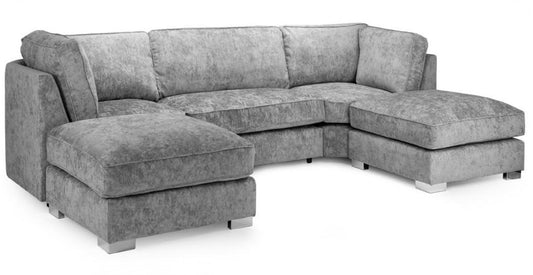 A gray upholstered sectional sofa with a chaise lounge on the left and a matching ottoman, shown on a plain white background.