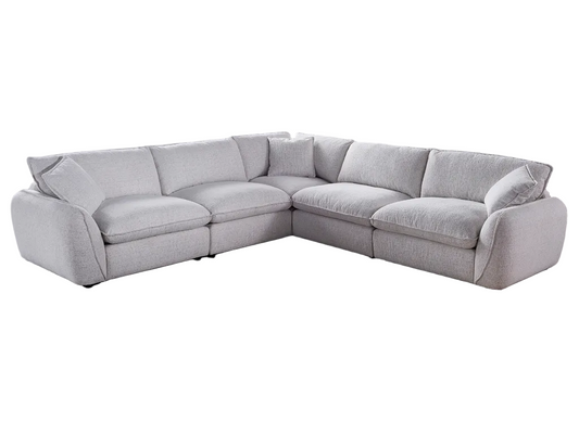 Beige sectional sofa on a white background