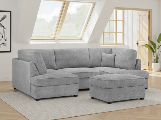 Gray sectional sofa with ottoman in a bright living room
