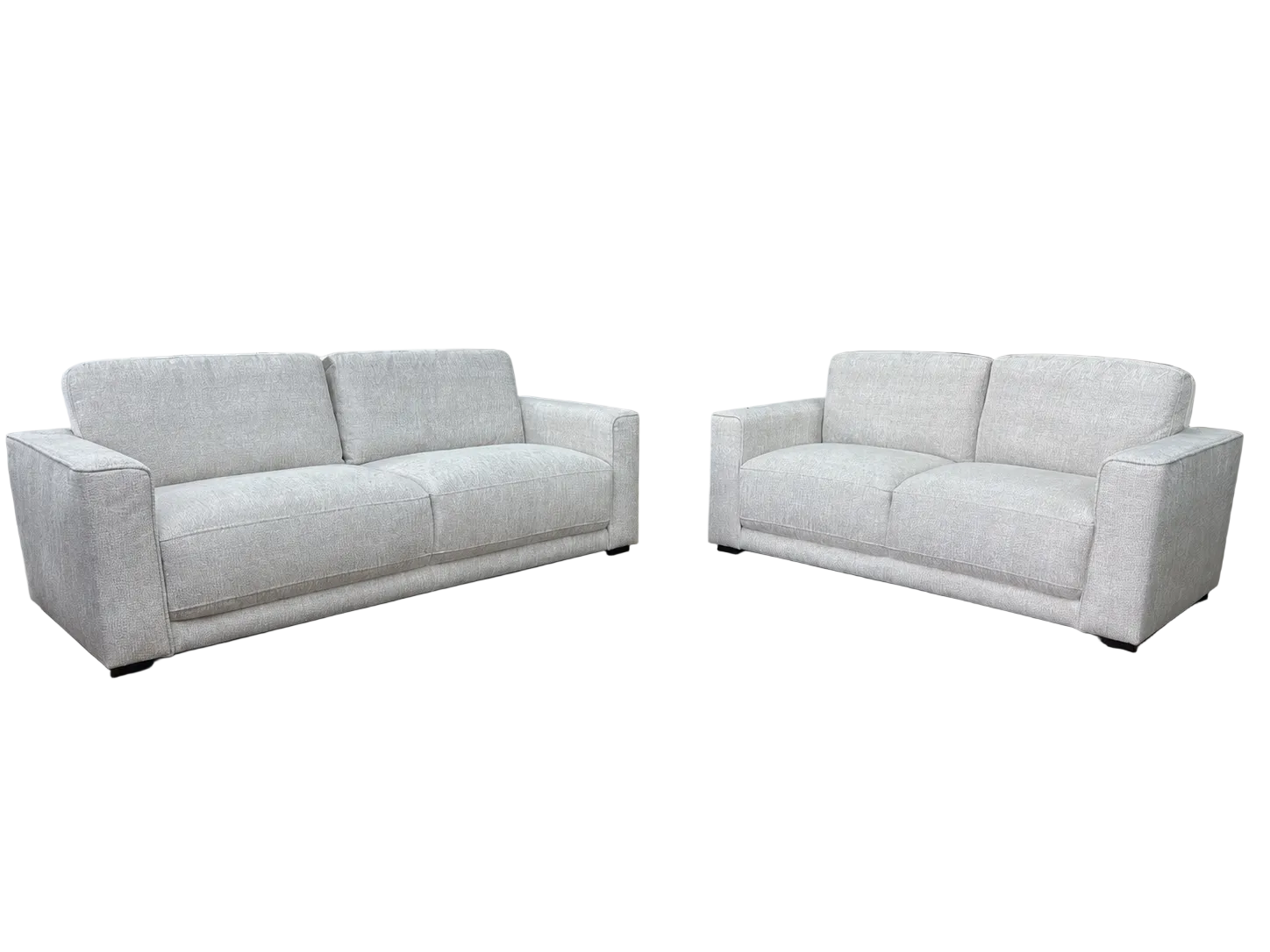 Marlow beige three and two-seater sofa set in a bright modern living room