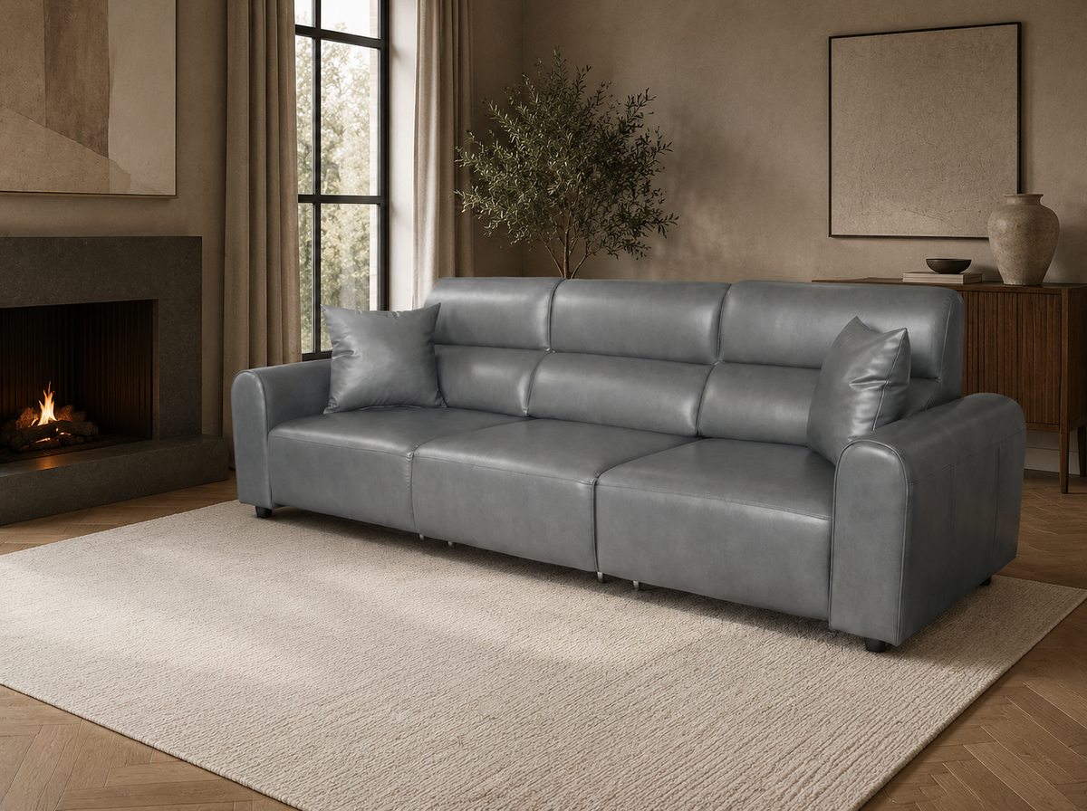 Conway grey electric three-seater sofa with matching cushions in a contemporary living room