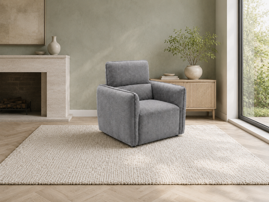 Ascot grey fabric armchair in a warm contemporary living room