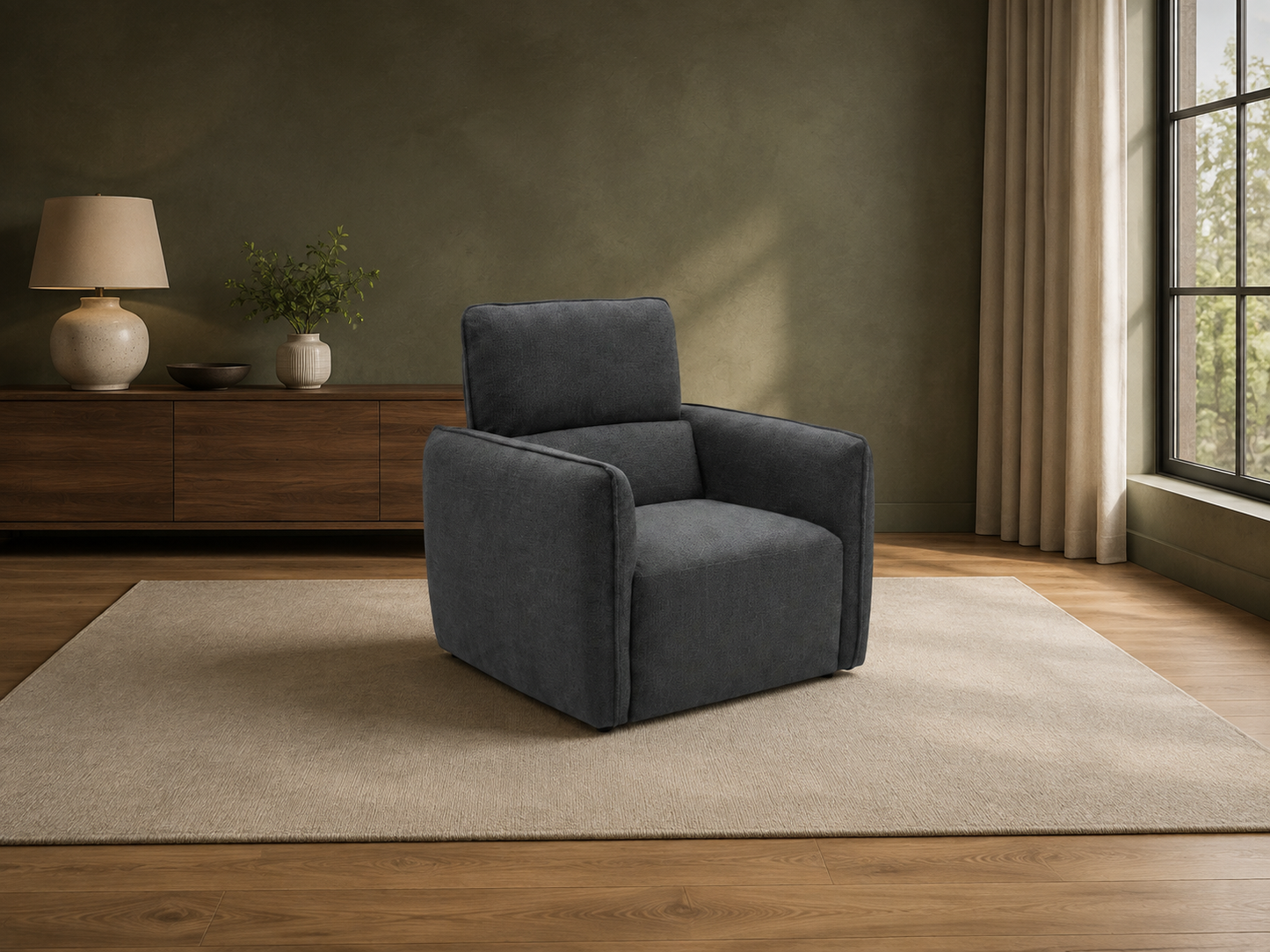 Ascot charcoal fabric armchair in a contemporary olive green living room