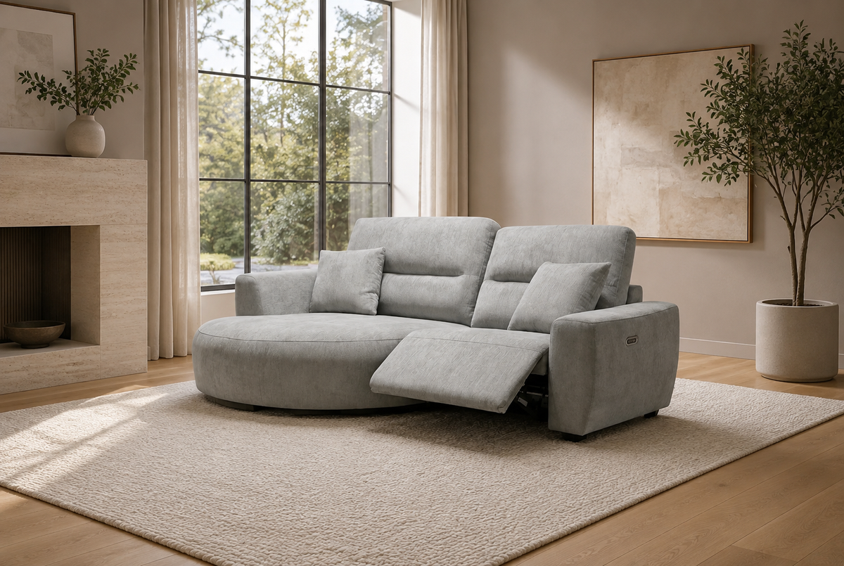 Denver grey left-hand electric recliner corner sofa in a modern living room with grey pillows 