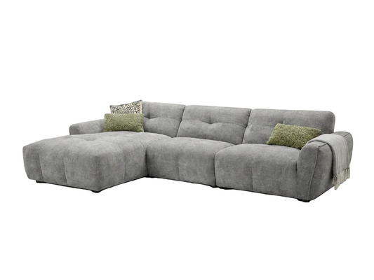 A modern L-shaped sectional sofa upholstered in textured light gray fabric, featuring a chaise lounge on the left, against a plain white background.
