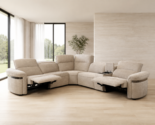 A curved upholstered sectional sofa in a light beige fabric, shown with both chaise lounge sections extended in a bright, modern living room .