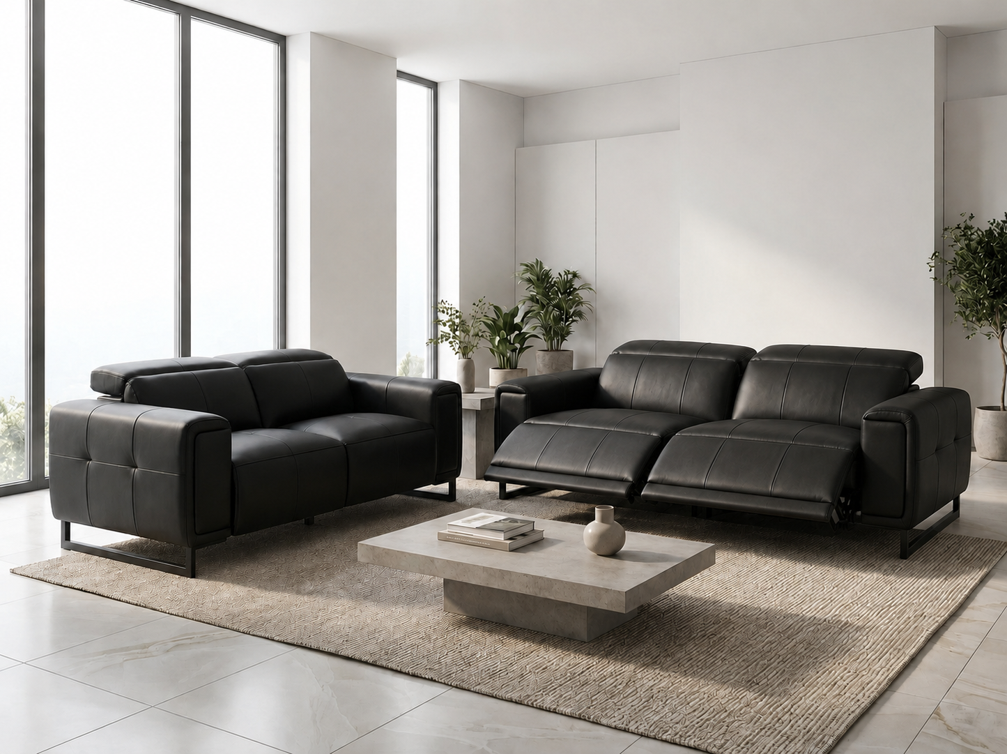A modern living room setup featuring a black leather loveseat and a matching black leather reclining sofa on a large beige rug, with a low concrete coffee table in the center.