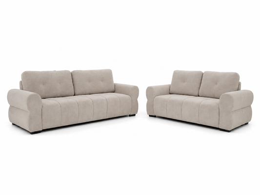 A light beige upholstered three-seat sofa and a matching two-seat loveseat shown side by side on a plain white background.