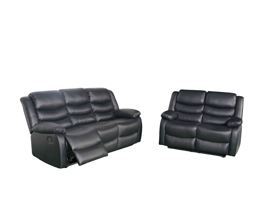Black leather recliner sofa on a white background.