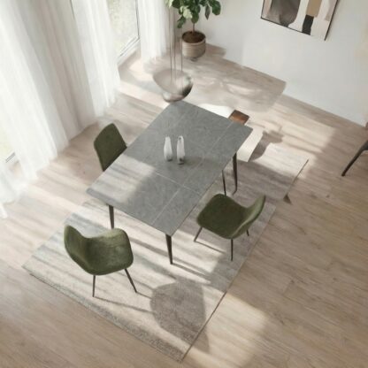 A modern dining set featuring a rectangular gray stone-look table.