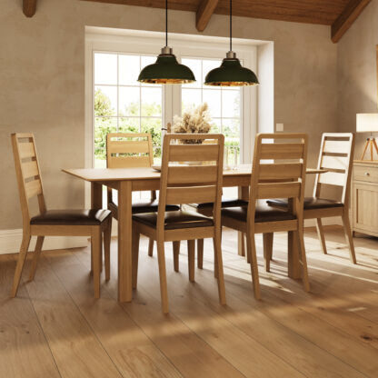 Dining room with wooden table and chairs 