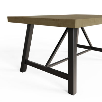 A modern rectangular table with a light brown wood grain top and a black metal frame with diagonal support beams, shown on a white background.