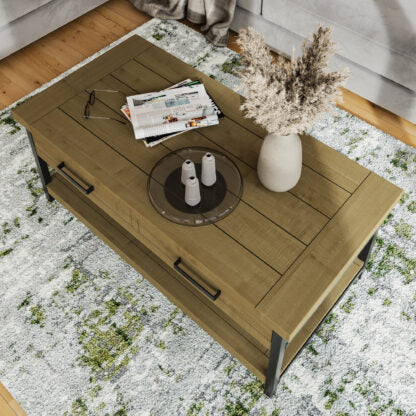 Wooden coffee table with decorative items on a textured rug