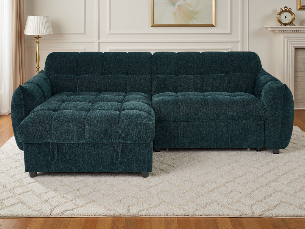 Teal sectional sofa in a living room setting with a lamp and framed picture on the wall.