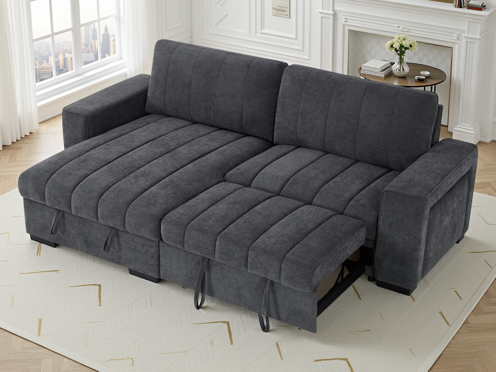 Gray sectional sofa in a living room setting with a fireplace and window.