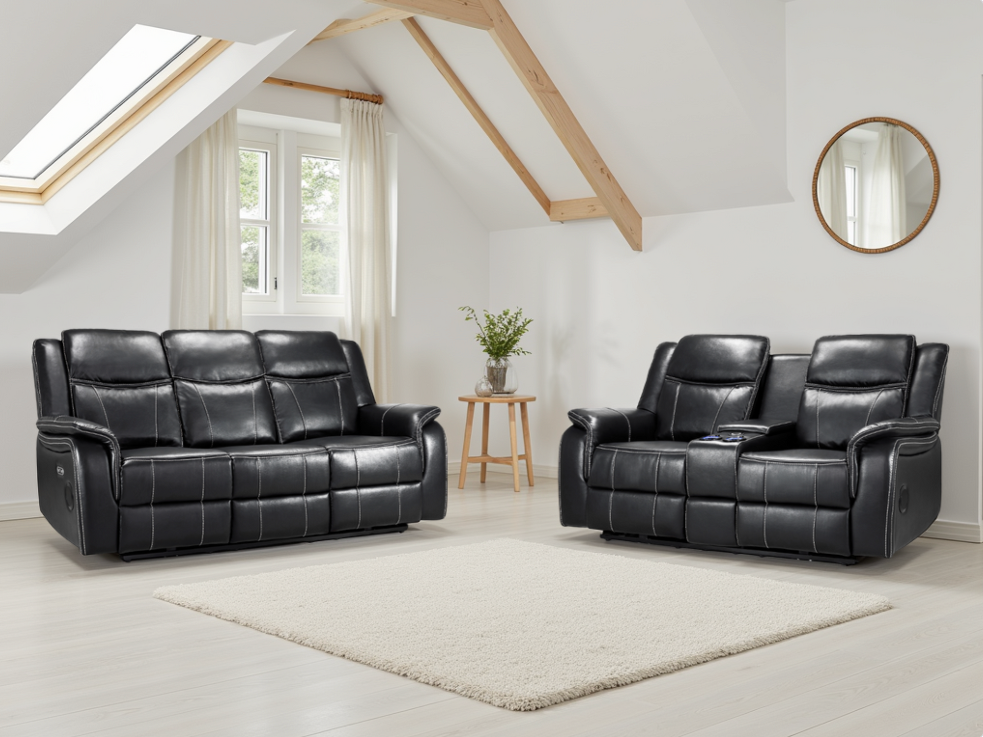 Black leather recliner sofa set in a modern living room with white walls and wooden beams.
