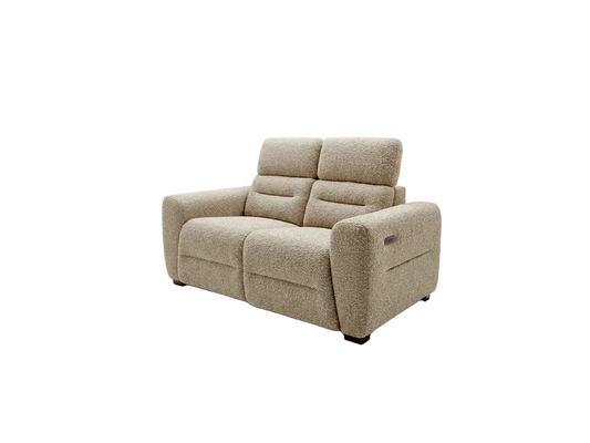 A two-seater reclining loveseat sofa upholstered in a textured beige bouclé fabric, shown from a three-quarter angle against a plain white background.
