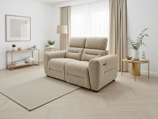 Beige recliner sofa in a modern living room with light wood flooring and neutral decor.