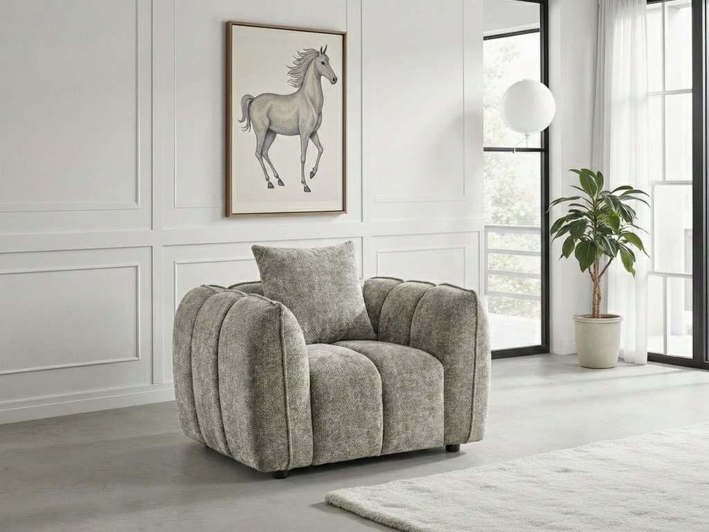 Gray armchair in a modern living room with a horse painting on the wall.