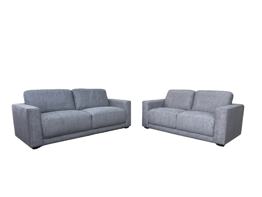 Marlow grey three and two-seater sofa set in a bright modern living room