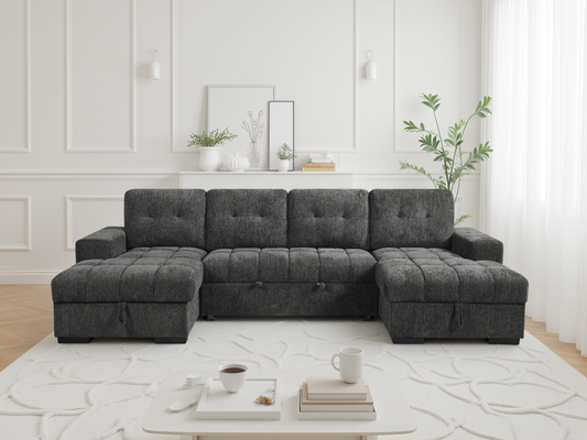 Gray sectional sofa in a living room with a coffee table and decor items.