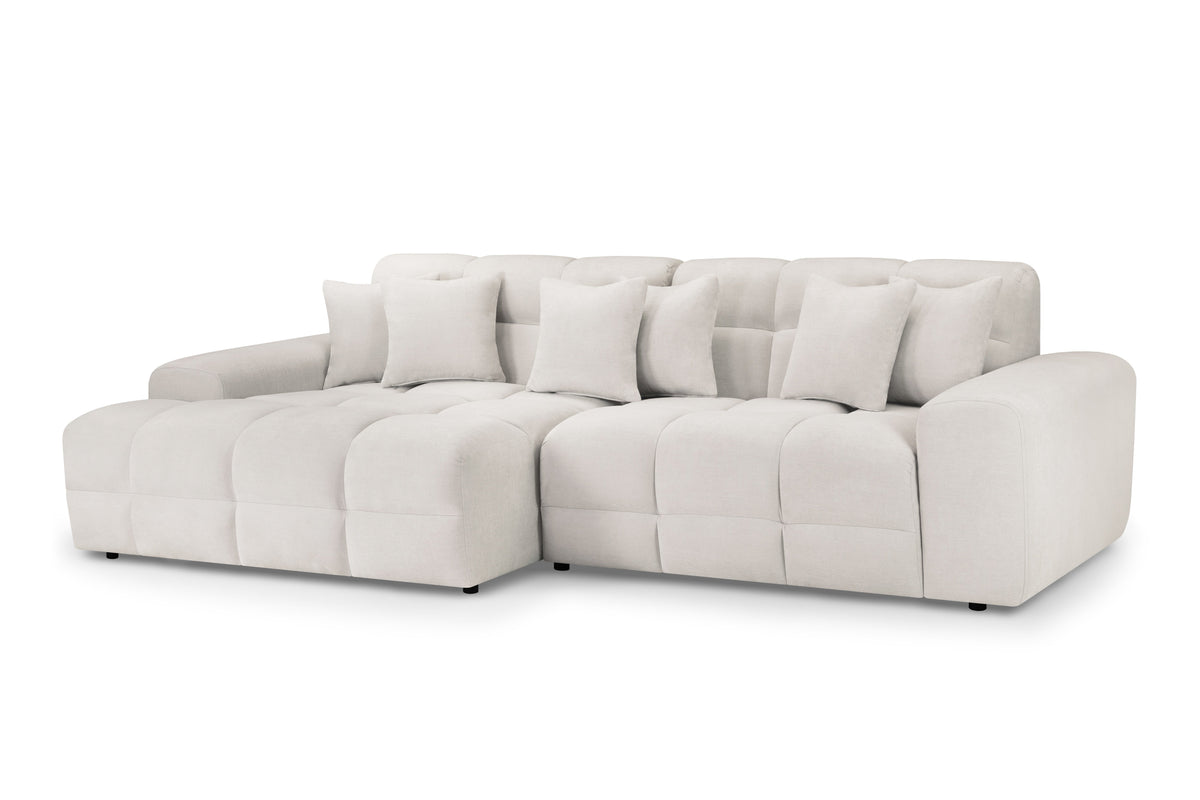 Light gray sectional sofa on a white background