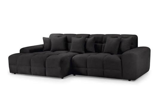 Black sectional sofa on a white background
