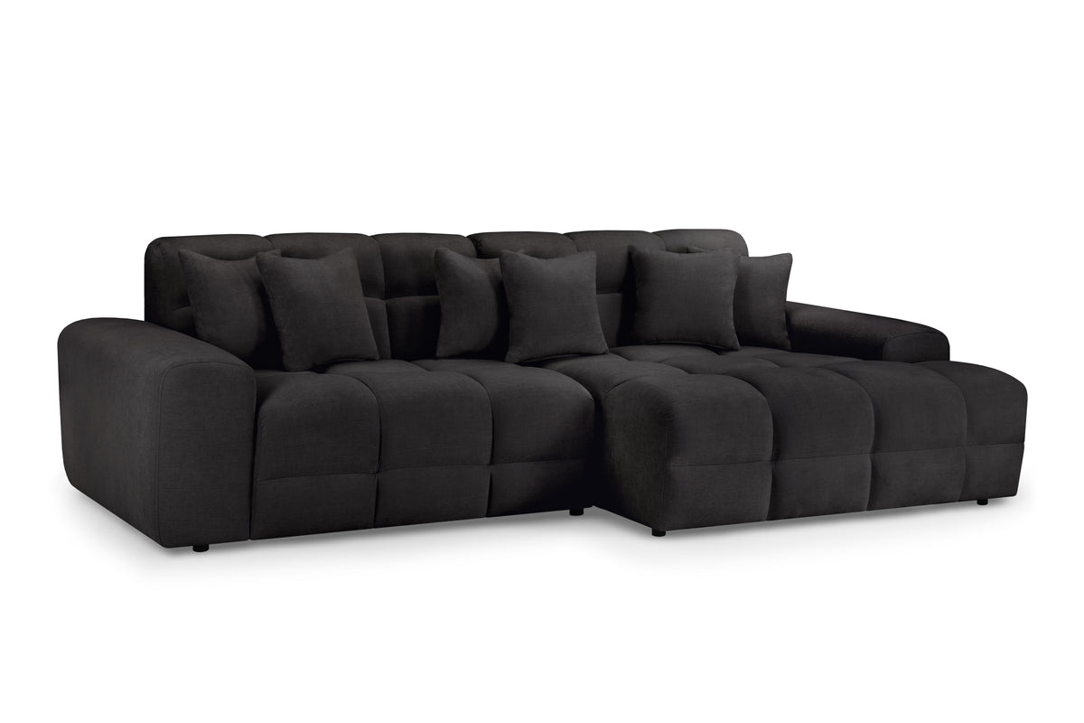 Black sectional sofa on a white background