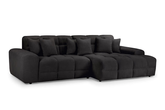 Black sectional sofa on a white background