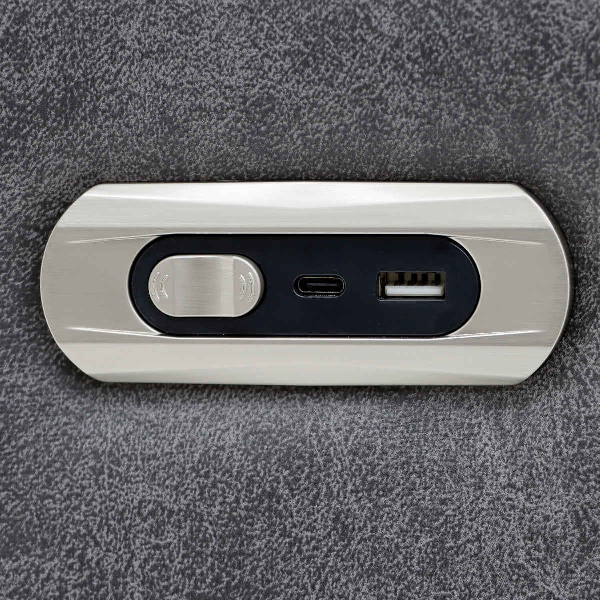 White electronic device with USB port and switch on a gray textured background