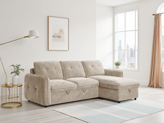 Beige sectional sofa in a living room with a lamp, side table, and window.
