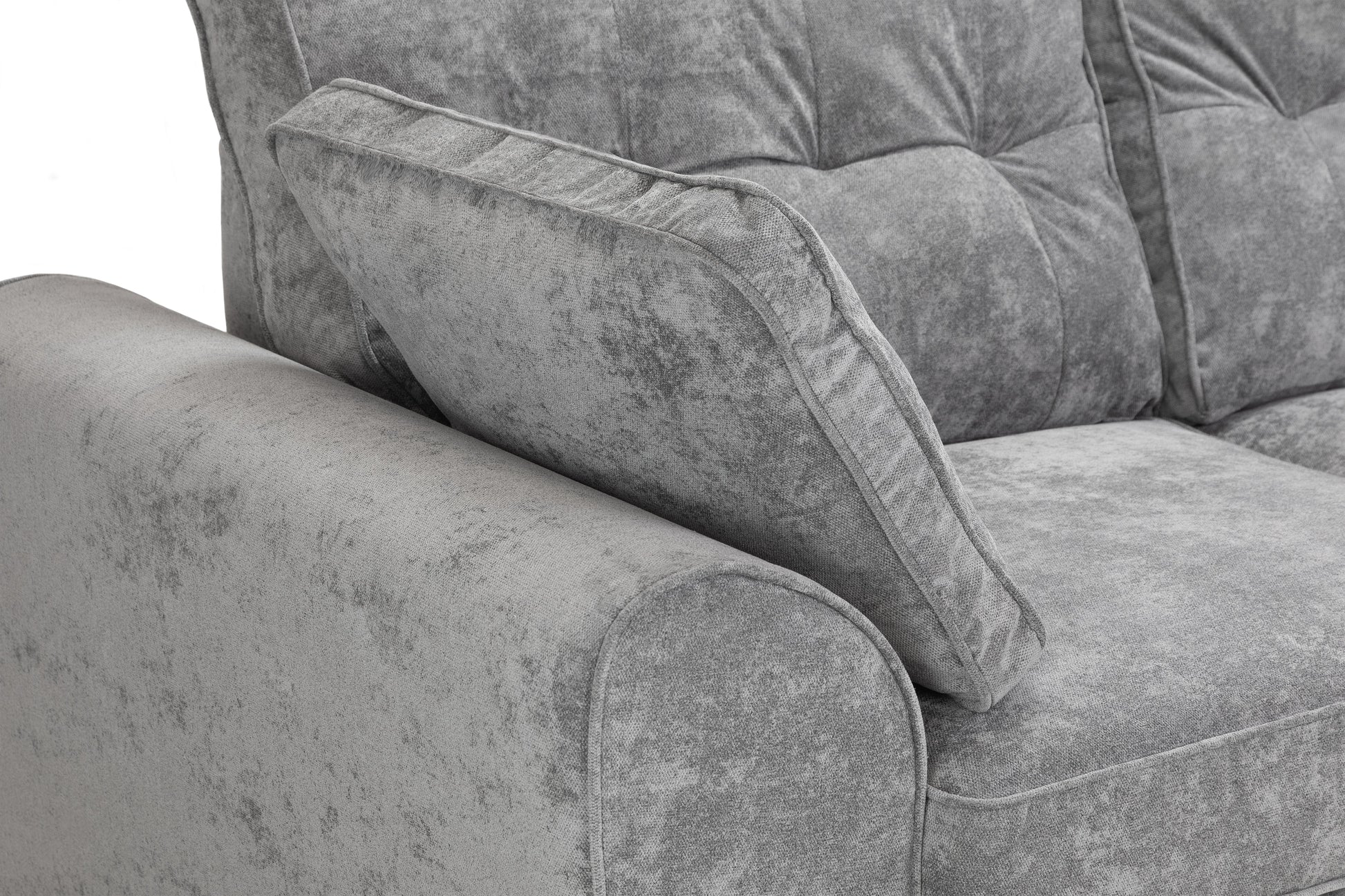 Gray textured sofa with a close-up of the armrest and cushion.