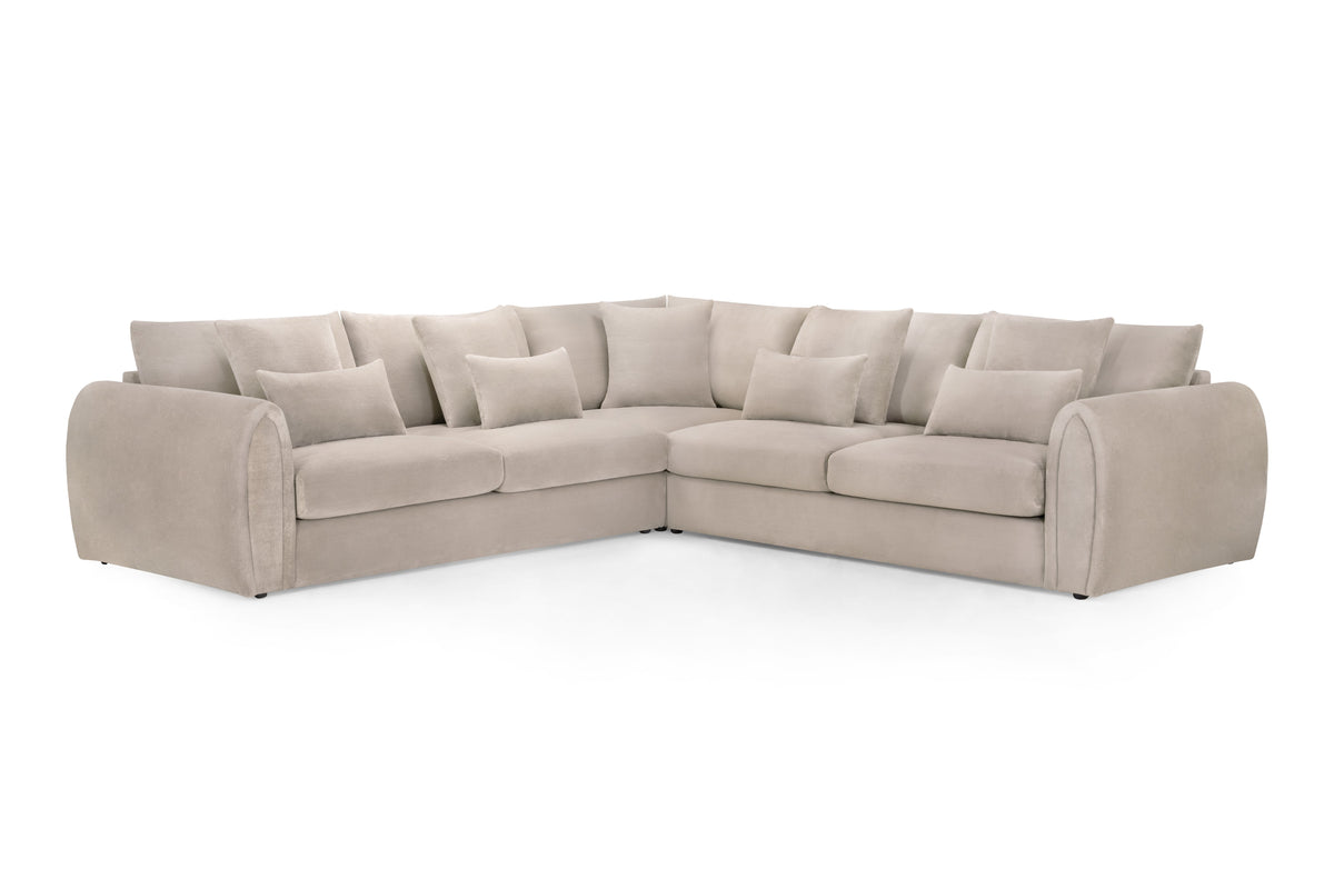 Beige sectional sofa on a white background